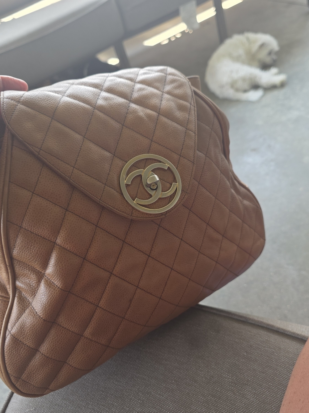 CHANEL Quilted Brown Leather Backpack with Gold CC Emblem